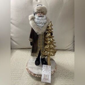 Gold and Brown Santa Figurine with golden tree and faux fur hat